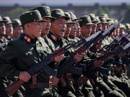 Korean People's Army (KPA) soldiers march during a mass rally on Kim Il Sung square in Pyo