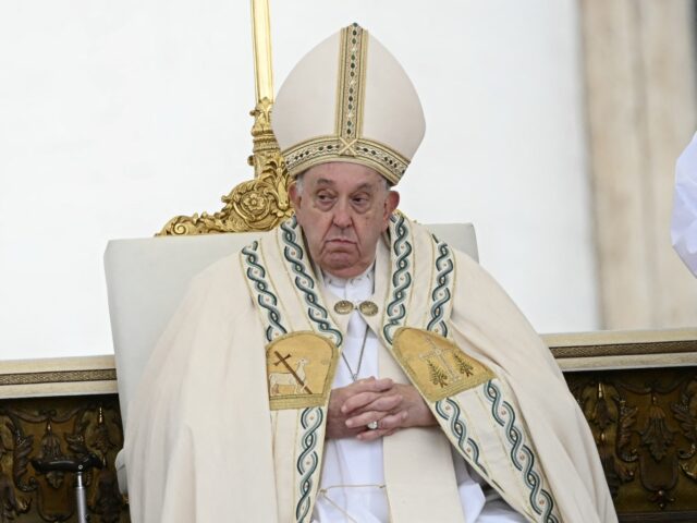 Pope Francis (R) attends the Holy Mass and canonisation of 14 saints and martyrs from Dama