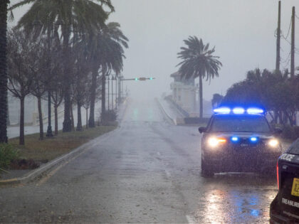 Police block access to beaches during Hurricane Milton in St. Petersburg, Florida, US, on