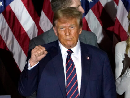 Republican presidential hopeful and former US President Donald Trump gestures during an El