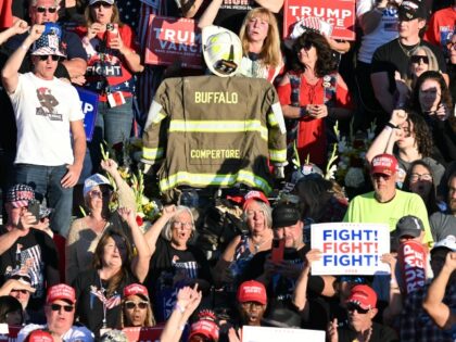 The uniform of slain firefighter Corey Comperatore is seen in the crowd as former US Presi