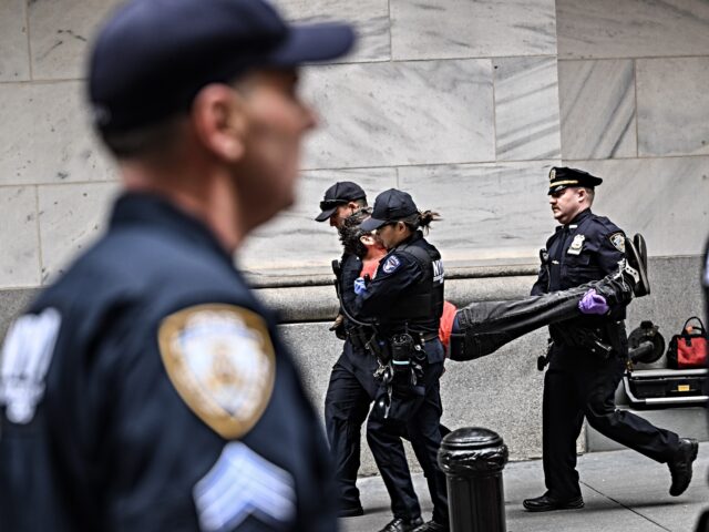 NEW YORK, UNITED STATES - OCTOBER 14: Officers from New York Police Department detain some