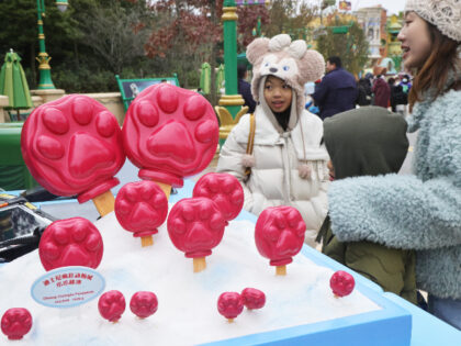 SHANGHAI, CHINA - DECEMBER 16: Tourists purchase Pawpsicle at Zootopia land during its tri