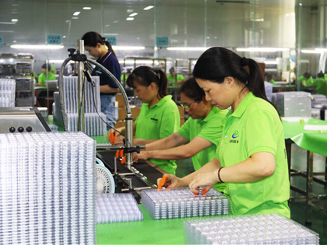 NANYANG, CHINA - AUGUST 27: Employees carry out final checks on lithium batteries at a new