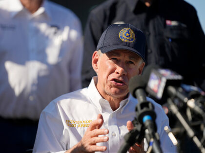 Texas Gov. Greg Abbott is joined by fellow governors during a news conference along the Ri