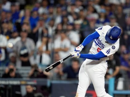 Los Angeles Dodgers' Freddie Freeman hits a walk-off grand slam against the New York