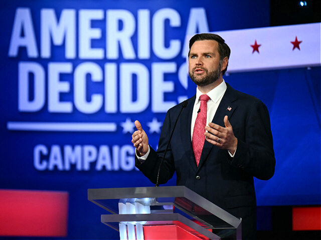 TOPSHOT - US Senator and Republican vice presidential candidate J.D. Vance speaks during t