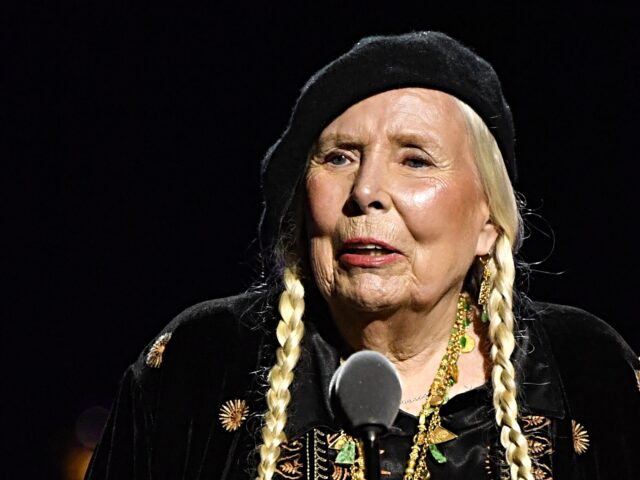 Canadian singer-songwriter Joni Mitchell accepts the "Best Folk Album" award for "Joni Mit