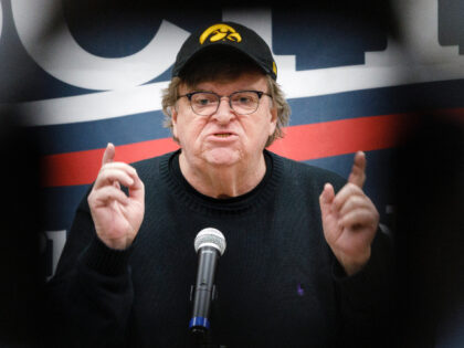 CRESTON, IA - JANUARY 31: Filmmaker and director Michael Moore speaks to an audience at a