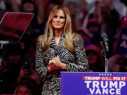 Former first lady Melania Trump waves before Republican presidential nominee former Presid