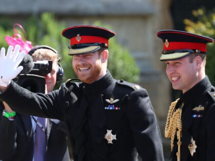 TOPSHOT - Britain's Prince Harry, Duke of Sussex, arrives with his best man Prince William