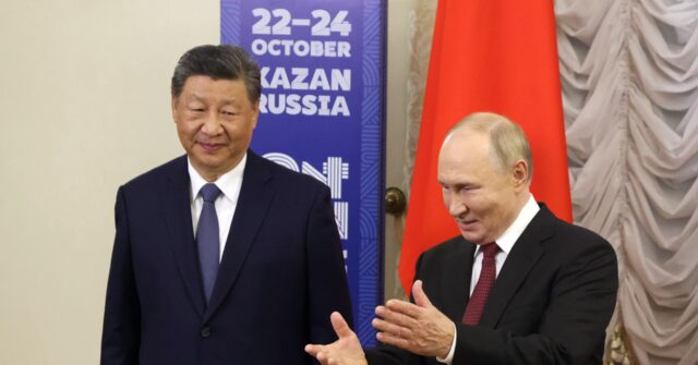 Best Friends: Putin Gives Xi Jinping Top Billing at Anti-U.S. BRICS Summit