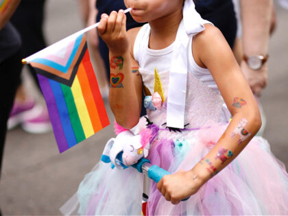 A young child participates in the Annual New York Pride March on June 25, 2023 in New York