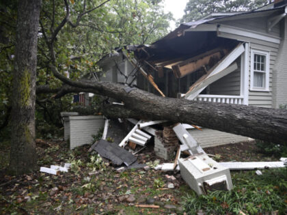 CHARLOTTE, USA - SEPTEMBER 27: Trees fall on houses and road after hurricane Helene hits t