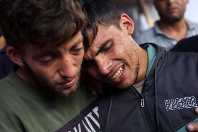 Ali Assaf (R), 20, was reported to be the only survivor of an Israeli air strike on Jabali