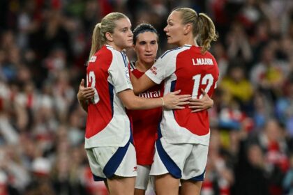 Arsenal's Mariona Caldentey celebrates her goal with Alessia Russo (L) and Frida Maanum (R