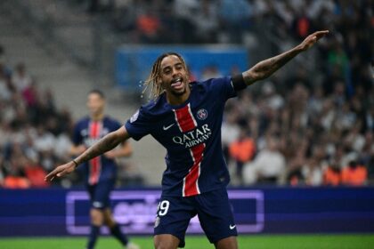 Bradley Barcola celebrates after scoring Paris Saint-Germain's third goal during their 3-0