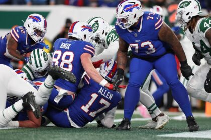 Buffalo quarterback Josh Allen scores a touchdown in the Bills' NFL victory over the New Y