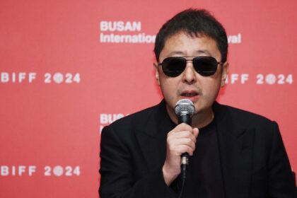 Chinese film director Jia Zhangke discusses his new film 'Caught by the Tides' with report