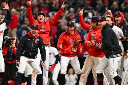 The Cleveland Guardians celebrate David Fry's game-winning home run in the 10th inning to