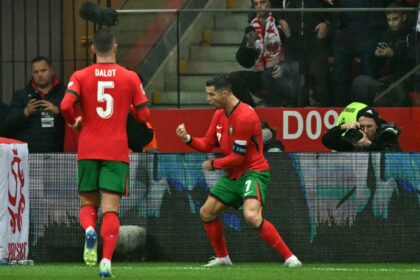 Cristiano Ronaldo (R) scored his 133rd international goal in Portugal's win over Poland