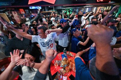 Fans cheer in a Tokyo bar as Shohei Ohtani's Los Angeles Dodgers win the World Series