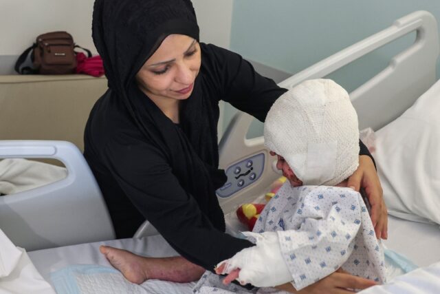 Fatima Zayoun with Ivana, who suffered third-degree burns in an Israeli strike