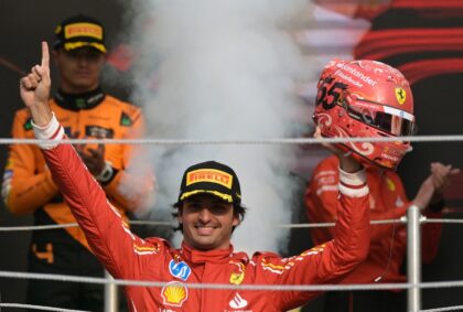 Ferrari's Spanish driver Carlos Sainz celebrates his victory in the Mexico City Grand Prix