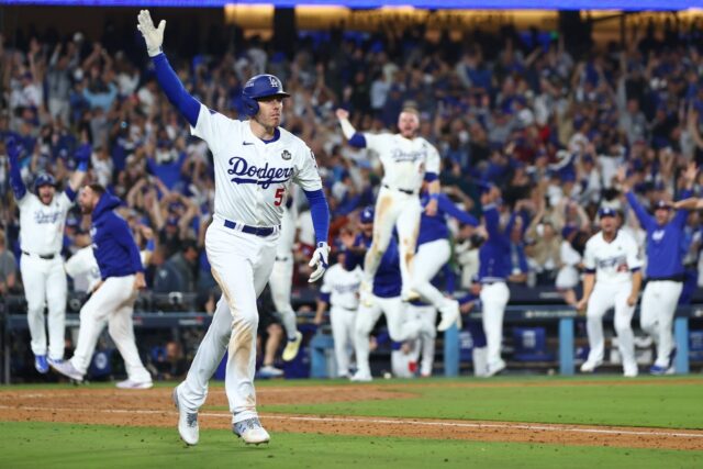 Freddie Freeman rounds the bases triumphantly after his walk-off grand slam for the Los An