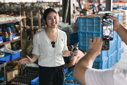 Second-generation Chinese factory owners like Robyn Qiu are turning to social media to pro