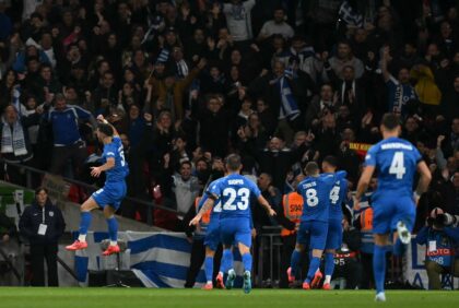 Greece celebrate the opening goal in their win against England