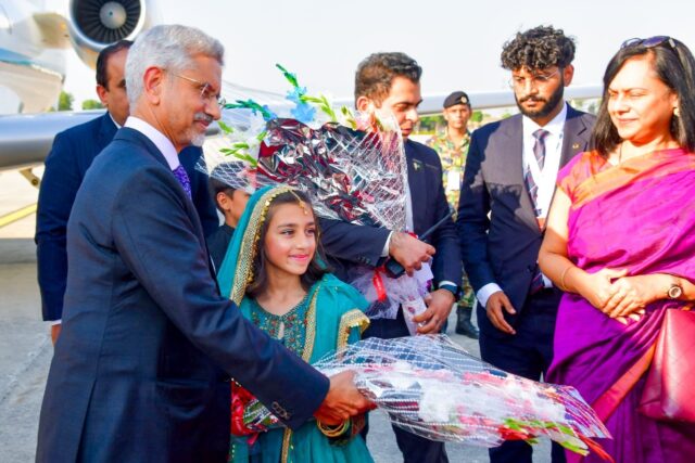 India's Foreign Minister Subrahmanyam Jaishankar (L) is greeted upon his arrival at Nur Kh