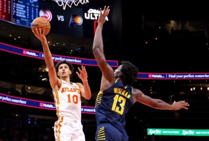 Indiana's James Wiseman, at right trying to defend Atlanta's Zaccharie Risacher, has torn