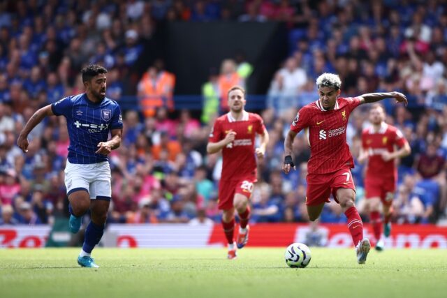 Ipswich Town's Massimo Luongo (L) has come out of international retirement for Australia