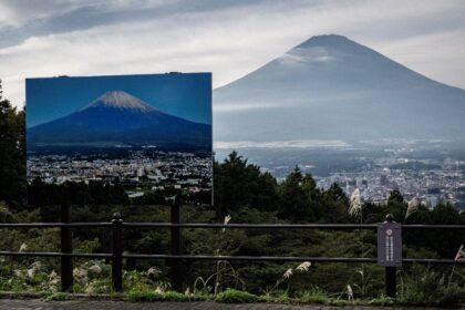 Japan's Mount Fuji, snowless for the longest since records began 130 years ago, is expecte