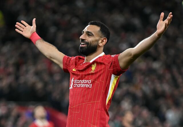 Liverpool's Mohamed Salah celebrates scoring against Bologna