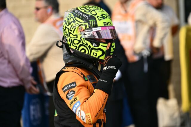 McLaren's Lando Norris celebrates his pole position after qualifying for the United States