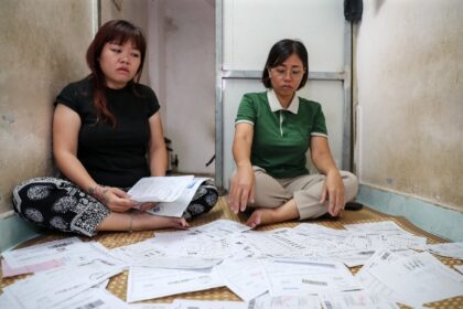 Nguyen Thi Huong (L) and Hoang Thi Cuc (R) are among the victims of a multi-billion dollar