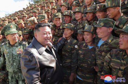 North Korean leader Kim Jong Un (centre L) told special operations forces his country woul