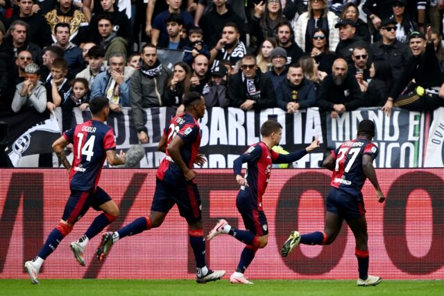 Razvan Marin (2R) celebrates his penalty which earned Cagliari a 1-1 draw at Juventus