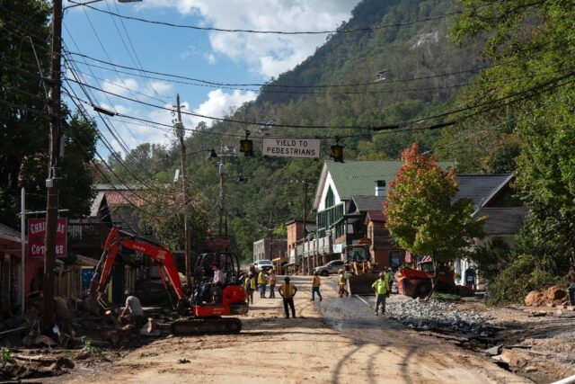 Repair crews at work in downtown Chimney Rock, North Carolina on October 2, 2024
