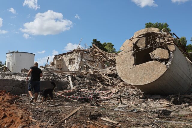 Rubble in a central Israeli city in the aftermath of the Iranian missile attack, Tehran's