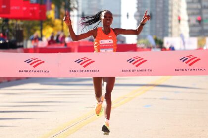 Ruth Chepngetich set a women's world record as she won the Chicago Marathon for a third ti