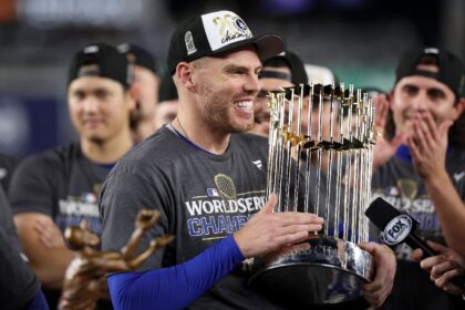 World Series Most Valuable Player Freddie Freeman of the Los Angeles Dodgers celebrates wi