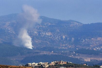 Smoke billows from the site of an Israeli air strike that targeted the southern Lebanese v