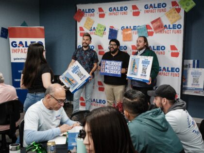 Staff and volunteers gather at the office of the Galeo Impact Fund, a voter outreach organ