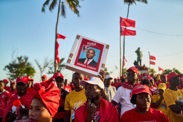 Supporters of the ruling Mozambique Liberation Front (Frelimo) attend a rally ahead of Wed