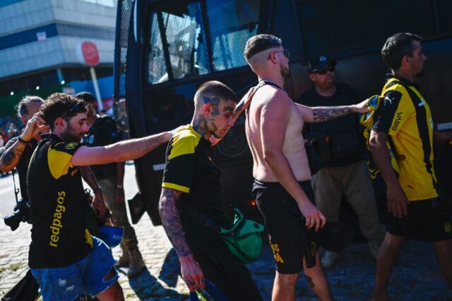 Supporters of Uruguay's Penarol are arrested after clashes with police in Rio de Janeiro