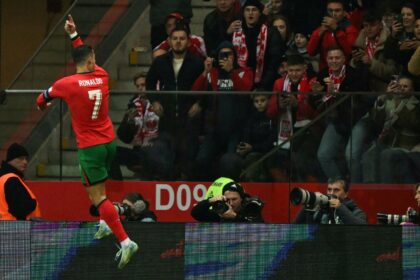 On target again: Cristiano Ronaldo celebrates scoring Portugal's second goal against Polan