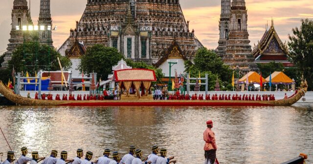 Thai King Celebrated with Royal Barge Procession